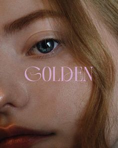 a close up of a person's face with the word golden on it in pink