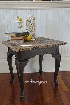 a small table with some books on it