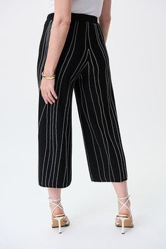 Joseph Ribkoff Wide Leg Striped Pants. Gorgeous, luxurious wide leg pants like this pair from Joseph Ribkoff are a must for the season. These have a flattering pull-on style and ample wide leg, giving your outfit a refined, unmatched elegance. 63% Viscose Rayon, 37% Nylon Elastic waist Side pockets No zipper Wide Our model is 5'9"/175 cm and wears a size 6. Approximate inseam length (size 12): 28" - 71 cm Luxury Striped Wide-leg Pants, Luxury Striped Wide Leg Pants, Luxury Striped Pants With Pockets, Luxury Black Pants With Side Stripes, Luxury Nylon Wide Leg Pants, White Rehearsal Dress, Style Wide Leg Pants, Perfect White Tee, Linen Bottoms