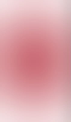 a blurry image of pink and white colors