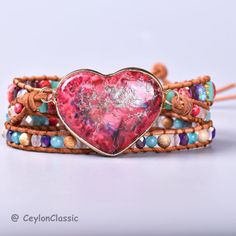 PLEASE READ THIS DESCRIPTION CAREFULLY!  First of all, you are warmly welcomed to my newly started Etsy shop!  This High-quality unique Spiritual Heart Shape Triple stands Jasper wrap Bracelet made by Jasper, Crystal, Metal & Genuine Leather. Size is Around 20 inches +3 Closures.it is 100% handmade and of exquisite quality.  This classy cute bracelet can be delivered to some countries like the UK within 7-14 DAYS. These days this necklace is available at a SPACIAL DISCOUNT and I can guarantee 10 Bohemian Beaded Bracelets For Valentine's Day, Adjustable Heart-shaped Gemstone Beads Jewelry, Bohemian Bracelets With Heart Beads For Valentine's Day, Bohemian Heart Beads Bracelets For Valentine's Day, Adjustable Heart-shaped Spiritual Bracelets, Bohemian Heart-shaped Beaded Bracelets For Healing, Adjustable Gemstone Beads Jewelry For Valentine's Day, Adjustable Hand-strung Heart-shaped Jewelry, Adjustable Spiritual Bracelets For Valentine's Day