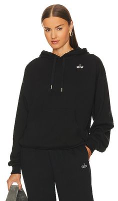 Find ALO Accolade Hoodie on Editorialist. alo Accolade Hoodie in Black. - size L (also in M, S, XS) alo Accolade Hoodie in Black. - size L (also in M, S, XS) Self: 65% cotton 35% polyester Contrast Fabric: 58% cotton 38% polyester 4% elastane. Made in Vietnam. Machine wash recommended. Front silver-tone Alo logo. Attached drawstring hoodie. Front kangaroo pocket. Fleece lining. Item not sold as a set. ALOR-WK78. U3032RG. alo is fueled by good health, good feelings, good fabrics, the greater good Alo Leggings, Good Feelings, Bridge Pose, Hooded Jumper, Vinyasa Flow, Leggings Hoodie, French Terry Hoodie, Fall Hoodies, Yoga Activewear