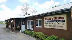 there is a sign on the building that says miller's bakery