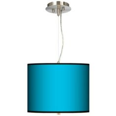 a light fixture with a blue shade hanging from it's side, on a white background