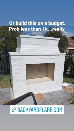 DIY Outdoor Fireplace in Backyard with cinderblock. Veneer is painted white wash. Prescott design with angled chimney and no seating hearth. Small Outside Fireplace Ideas, Build Outdoor Fireplace Diy, Gas Outdoor Fireplace Ideas, Front Yard Fireplace, Cement Outdoor Fireplace, Diy Brick Outdoor Fireplace, Outdoor Fireplace Dimensions, Paver Patio With Fireplace, Diy Outdoor Stone Fireplace