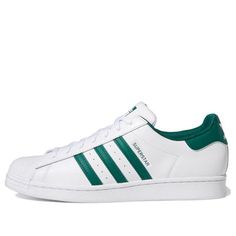 The adidas Superstar 'Cloud White Collegiate Green' is a timeless classic that will never go out of style. With its iconic basketball silhouette and multi-jewel embellishments on the laces, this sneaker is perfect for any streetwear look. The leather upper and rubber shell toe remain true to the classic design, while the white and green colorway adds a modern touch. Whether you're hitting the court or the streets, the adidas Superstar is the perfect choice for any activity. This sneaker is a tribute to the 50-year-old legacy of the Superstar series. (SNKR/Cozy/Skate/Unisex/Low Top/Wear-resistant) Classic Green Adidas Sneakers, Lace-up Sneakers With Three Stripes For Streetwear, High-top Synthetic Sneakers With Three Stripes Branding, Adidas Synthetic Sneakers With Three Stripes, Streetwear Synthetic Sneakers With Three Stripes, Basketball Silhouette, Adidas Originals Superstar, Cloud White, The Court