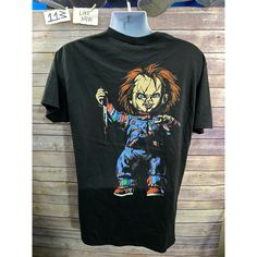 a black t - shirt with an image of a clown holding a tennis racquet