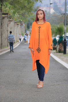 ● Made carefully and Beautifully ● It really looks good and comfortable when it's Dressed. ● A great gift for your loved Ones. ● The Size is 37 Inches Long! ● Hand wash Orange Tunic Dress For Beach Cover-up, Long Sleeve Orange Tunic For Summer, Orange Long Sleeve Kaftan For Spring, Long Sleeve Orange Kaftan For Spring, Orange Long Sleeve Spring Kaftan, Free Size Long Sleeve Festival Dress, Festival Long Sleeve Free Size Dresses, Long Sleeve Free Size Festival Dress, Orange Long Sleeve Dress For Beach Cover-up