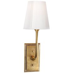 a wall light with a white shade on the side and a gold metal frame around it