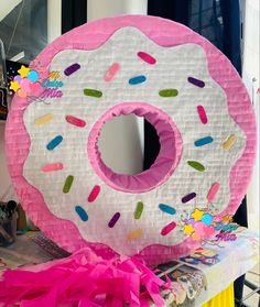 a giant donut shaped like a doughnut with sprinkles