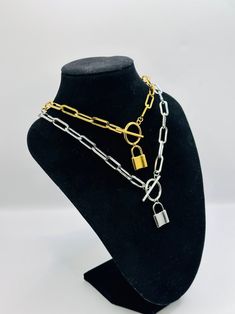 It is bold and will definitely stand you out from the crowd. #jewelrygram #gemstones #weddingdesigns #jewelryoftheday #womenaccessories Silver Chain Necklace With Lock, Metal Chain Link Necklace With Lock, Silver Metal Necklace With Lock Detail, Metal Chain Necklace With Lock For Gift, Gold Chain Link Necklace With Lock, Silver Lock Chain Necklace As A Gift, Silver Chain Necklace With Lock For Gifting, Silver Chain Necklace With Lock For Gift, Gold Chain Necklace With Lock For Gift