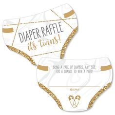 two diaper raffles with gold glitter on them