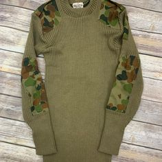 Elegant Knitting Co. Australian Army- Jumper This Jumper Knitted In A Rib Stitch. The Shoulders And Elbows Are Reinforced In Dpcu Camouflage Pattern Cotton Fabric. There Is Also A Pocket On The Left Sleeve. Condition- Like New Size: 115-125 Cm Xl 80% Wool 20% Nylon Wool Long Sleeve Fair Isle Pattern Top, Wool Knit Long Sleeve Tops, Fitted Fair Isle Pattern Crew Neck Top, Fitted Crew Neck Acrylic Top, Fitted Acrylic Crew Neck Top, Fitted Knit Crew Neck Outerwear, Fitted Long Sleeve Sweater With Fair Isle Pattern, Australian Army, Rib Stitch