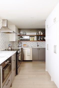 the kitchen is clean and ready for us to use it's stainless steel appliances