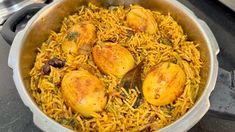 a pot filled with food sitting on top of a stove