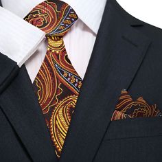 The Blue, Brown, and Black Silk Necktie with a Paisley Pattern Add a touch of sophistication to your wardrobe with our luxurious silk necktie, featuring an intricate paisley pattern in shades of blue, brown, and black. Available in a traditional width of 3.4 inches, this necktie comes in two lengths: regular (60 inches) and extra-long (63 inches). You can choose to purchase it with a matching pocket square for a coordinated look, or as a standalone piece for versatile styling. Styling Tips: Suit Elegant Semi-formal Neckwear With Paisley Print, Blue Paisley Print Ties For Business, Elegant Semi-formal Paisley Print Ties, Classic Paisley Print Patterned Ties, Luxury Elegant Paisley Print Ties, Light Blue Dress Shirt, Charcoal Gray Suit, Paisley Color, Paisley Tie