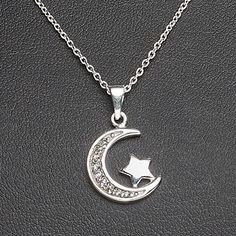 Tap into the contemporary minimalist jewelry trend with this "barely there" celestial necklace, featuring sparkling clear cubic zirconia set in a gleaming sterling silver crescent moon with star. Necklace finishes with popular springring clasp. Celestial Necklace, Contemporary Minimalist, Moon Necklace, Star Necklace, Minimalist Jewelry, Crescent Moon, Jewelry Trends, Gift Necklace, Crescent