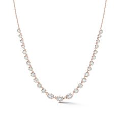 This tennis-style eternity necklace is the perfect hint of classic while firmly rooted in the present. The Maverick Diamond Riviera Necklace combines the classic tennis silhouette with our signature Alchemy setting to bring forward a modern feel. Handcrafted in 18-karat gold and featuring 3 marquise-shaped and 22 round, brilliant cut diamonds, the Maverick Riviera Necklace is a show-stopping must-have for any jewelry collection. Combine this necklace with heavier chain pieces like the Pia and Ph Timeless Diamond Cut Tennis Necklace, Timeless Tennis Necklace With Round Cut For Everyday Luxury, Timeless White Tennis Necklace With Prong Setting, Rose Gold Diamond Cut Tennis Necklace, Timeless Tennis Necklace With Vvs Clarity, Classic Rose Gold Tennis Necklace For Formal Occasions, Timeless White Tennis Necklace With Round Cut, Timeless White Round Cut Tennis Necklace, Elegant Rose Gold Round Tennis Necklace