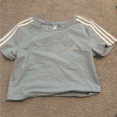 Brand New With Tags Size Medium Basic Adidas Tops With Three Stripes, Adidas Blue Tops With Three Stripes, Blue Adidas Tops With Three Stripes, Adidas Blue Three Stripes Top, Blue Three Stripes Tops For Summer, Basic Short Sleeve Tops With Three Stripes, Blue Cotton Tops With Three Stripes, Adidas Cotton Crew Neck Top, Basic Adidas Cotton Tops