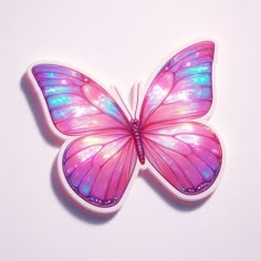 a pink and blue butterfly sitting on top of a white surface