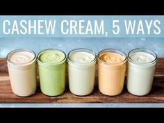 five jars filled with different types of creams on top of a wooden board and the words cashew cream, 5 ways