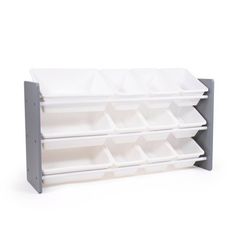 a white and gray shelf with six bins on each side, one is empty