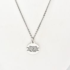 "This is a stainless steel laser engraved pendant on a stainless steel chain. The pendant has \"Many are the plans in a man's heart, but it is the Lord's purpose that prevails\" from Proverbs 19:21 on it. This pendant is available on your choice of 16, 18, 20, 22, 24, 26, 28 or 30 inch chain. The pendant is also available for individual purchase if you have another chain on which you would like to wear it. This necklace is made of stainless steel to withstand regular wear without tarnishing or c Proverbs 19 21, Bible Verse Jewelry, Father Son Gifts, Scripture Jewelry, Gifts For Baseball Players, Scripture Gift, Hamsa Earrings, Hamsa Jewelry, Bible Verse Gifts