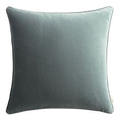 a light blue pillow on a white background