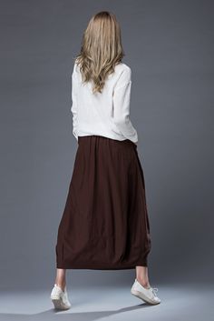 "★★ Welcome to my Ylistyle shop！！！ All our orders are tailor-made for you. specially made for you. I design new styles every week, please collect my store. I believe that you will meet your favorite styles. This very versatile brown linen skirt will be one you'll wear again and again. It is a timeless classic that will never date and will suit so many different occasions from lunch with the girls to wearing it to the office or simply everyday around the house whilst you do your chores. Simple ye Fall Linen Long Skirt, Casual Linen Skirt For Fall, Asymmetrical Cotton Skirt With Pockets, Casual Asymmetrical Linen Skirt, Casual Linen Asymmetrical Skirt, Brown Flared Maxi Skirt With Pockets, Brown Cotton Maxi Skirt With Lining, Brown Relaxed Maxi Skirt With Lining, Brown Flowy Maxi Skirt With Pockets