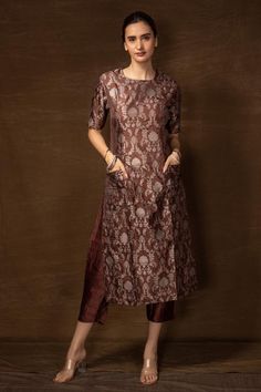 Brown banarasi silk kurta with floral pattern and side pockets. Comes with pant.
Components: 2
Type Of Work: Floral
Neckline: Round
Sleeve Type: Half
Fabric: Banarasi silk
Color: Brown
Other Details: 
Side slits on kurta
Occasion: Sangeet - Aza Fashions Tissue Kurta Design, Round Neck Embroidery Designs For Kurtis, Banaras Suit, Banarsi Suit Design Latest, Khatwork Kurti, Banarasi Suits, Satin Kurta, Honey Suckle, Banarasi Suit