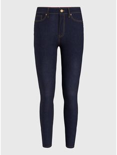 Tommy Hilfiger women's jean. You'll find a million ways to wear this pair. Dark wash stretch denim in an ultra skinny fit offers a sleek, versatile look you'll reach for again and again.  Material: 65% Better Cotton Initiative, 20% Recycled Cotton, 13% Polyesther Pes. Tommy Hilfiger Denim Bottoms, Tommy Hilfiger Fitted Bottoms For Fall, Fitted Tommy Hilfiger Bottoms For Fall, Slim Fit Tapered Leg Jeans With Elastane, Slim Fit Tapered Leg Elastane Jeans, Slim Fit Elastane Jeans With Tapered Leg, Versatile Fitted Jeans With Tapered Leg, Dark Wash Jeggings For Work, Stretch Jeggings With Five Pockets For Work