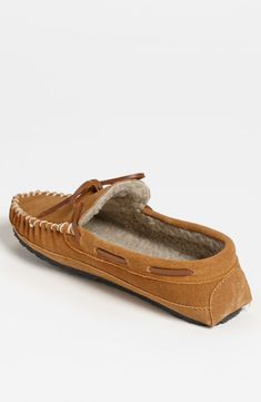 A plush faux-shearling lining insulates a soft suede slipper against cold mornings. Style Name:Minnetonka 'Casey' Slipper. Style Number: 906954. Suede Slippers With Plush Lining And Round Toe, Comfortable Slip-on Winter Moccasins, Winter Suede Slippers With Cushioned Footbed, Winter Suede Moccasins With Rubber Sole, Sheepskin Slip-on Slippers For Fall, Winter Leather Footbed Slip-on Slippers, Closed Toe Suede Slippers For Winter, Winter Slip-on Slippers With Leather Footbed, Fall Slippers With Suede Lining And Round Toe