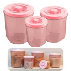 three pink containers with lids are sitting next to each other