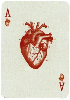 a red and white playing card with an image of a heart in the middle of it