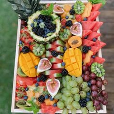 a tray filled with lots of different types of fruit