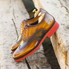 Ambrogio Bespoke Men's Shoes Cognac & Green Patina Leather Brogue Oxfords (AMB2247) Material: Patina Leather Hardware: None Color: Cognac & Green Outer Sole: Rubber Sole Hand-Painted Patina Leather Upper Wingtip Oxfords Design Create using Anticatura Method Zurigo Toe Shape Comes with box and dust bag 100% Handmade in Spain, using only the highest qualities of leathers and other materials 4954-MULTI Exclusive to Ambrogio Collection Note: This is a "Special Order" product, production takes approx Men's Dress Shoes, Leather Brogues, Leather Dye, Wingtip Oxford, Leather Slip On Shoes, Brogue Shoes, Men's Shoe, Red Sole, Red Heels