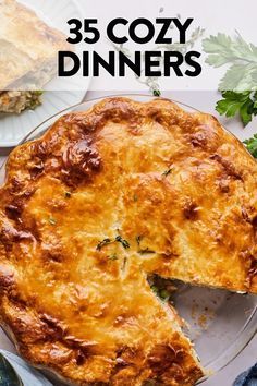 there is a pie that has been cut in half and served on a plate with the words, 35 cozy dinners