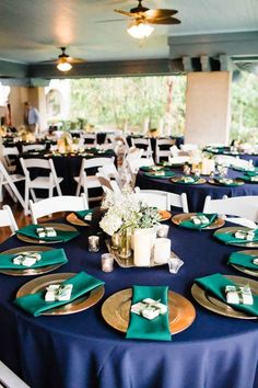 the tables are set with place settings for dinner