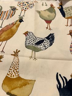 an image of chickens and roosters on white fabric