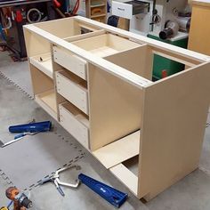 the cabinets are being built and ready to be installed in the shop or workshop area