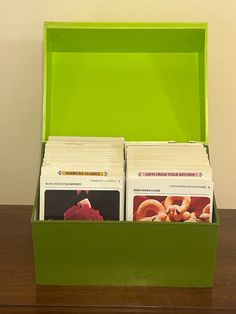 a green box with several cards in it