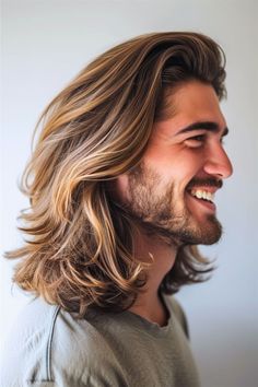 Here's a hairstyle that celebrates the richness of long, layered hair. With its natural waves and subtle highlights, it adds depth and character to your look. Click here to see more long hairstyles for men. ... less Mens Long Haircut Layered, Mens Long Layered Hairstyles, Men’s Long Wavy Hair, Mens Long Length Hairstyles, Mens Long Hairstyles Wavy Shoulder Length, Men S Long Hairstyle, Men’s Hairstyles Long