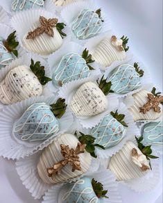 chocolate covered strawberries are arranged on paper plates