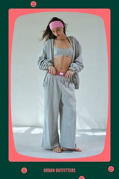 Cozy-cool Out From Under sweatpant in a relaxed, wide-leg silhouette. Designed with a mid-rise elasticated waistband made special with a layered boxer waistline topped with a branded patch. Exclusively at Urban Outfitters. Features Out From Under Hoxton layered boxer wide leg sweatpant Wide leg lounge pant Soft midweight knit Mid-rise layered elasticated waist Out From Under patch at the front Side pockets Wide leg fit Cropped length Easy pull-over style UO exclusive Content + Care 58% Cotton, 42% polyester Machine wash Imported Size + Fit Model in Grey is 5’9.5" and wearing size Small Measurements taken from size Small Waist: 24" Inseam: 26" | Out From Under Hoxton Layered Boxer Wide Leg Sweatpant in Grey, Women's at Urban Outfitters Wide-leg Loungewear Bottoms With Elastic Cuffs, Sporty Cotton Wide Leg Pants With Loosely Fitted Hips, Sporty Cotton Wide Leg Pants With Loose Fit, Sporty Relaxed Fit Pants For Loungewear, Casual Wide Leg Sleepwear, Sporty Loungewear Pants With Ribbed Waistband, Sporty Lounge Pants With Ribbed Waistband, Casual Sleepwear With Elastic Waistband And Wide-leg Pants, Relaxed Fit Bottoms With Ribbed Cuffs For Loungewear