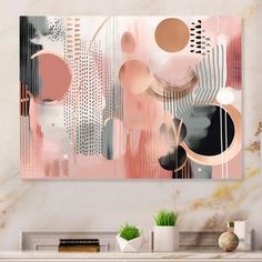 an abstract painting on the wall in a living room