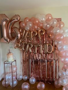 a birthday party with balloons and streamers