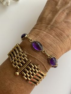 "This is lovely retro 14k Amethyst Cabochon Bracelet Very nice sized luscious purple gems - clean simple design. 14k Solid Yellow Gold Hallmarked 14k, Clara Six amethyst cabochons 4 ct ea Total-of 24 cttw Measures 7.25\" L x 7mm W Excellent condition" Cabochon Bracelet, Purple Gems, Bracelet Box, Tanzanite Ring, Halo Diamond Ring, Vintage Bracelets, Rose Cut Diamond, Solid Yellow, Chain Link Bracelet