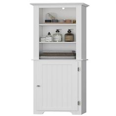 a white bathroom cabinet with shelves and soap dispensers