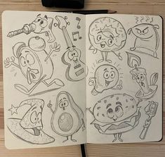 an open notebook with cartoon drawings on it