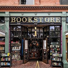 the front entrance to a bookstore with many books on display